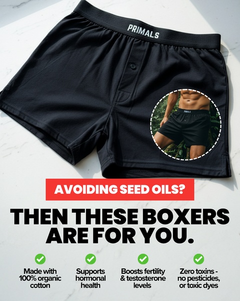 A clean, minimalist product-focused ad that highlights the health and performance benefits of organic cotton boxers through a targeted problem-solution angle.